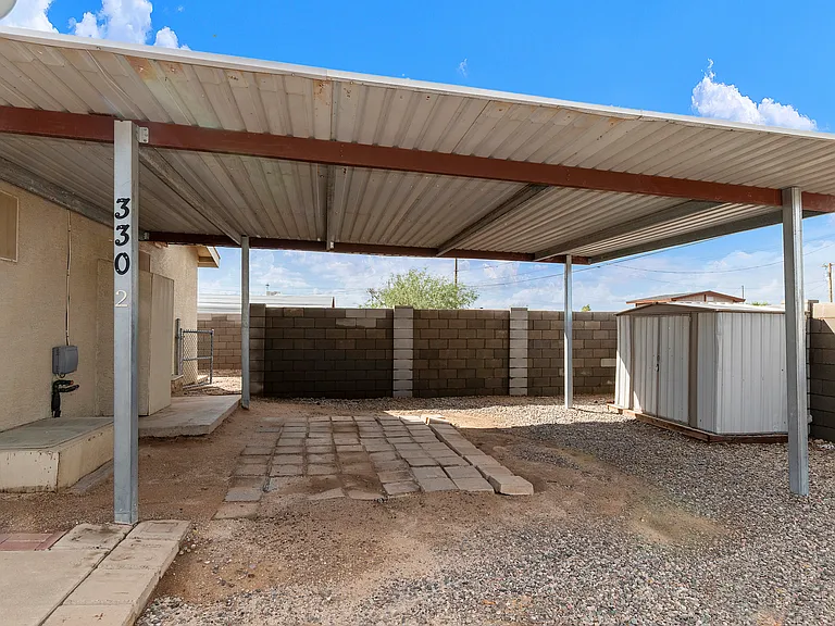CAR PORT FOR AND ATTACHED TO HOUSE #2