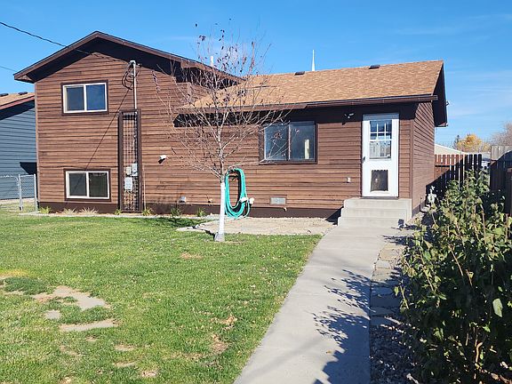 Back yard with storage and off street parking.