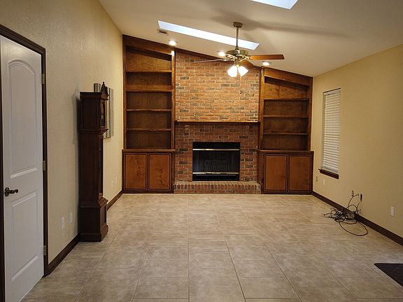 Den vaulted ceiling skylight