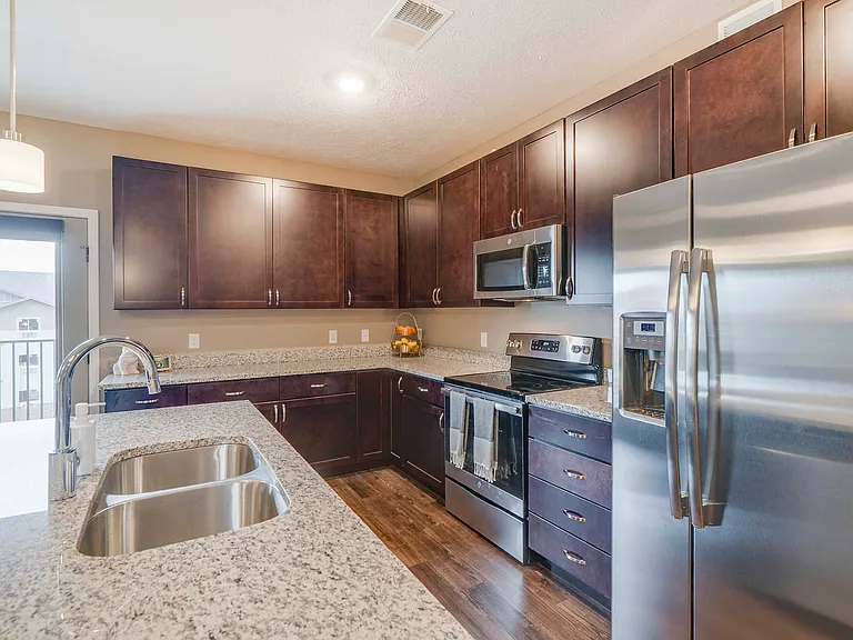 Our open kitchens offer ample counter space and modern finishes, perfect for preparing meals or hosting gatherings.