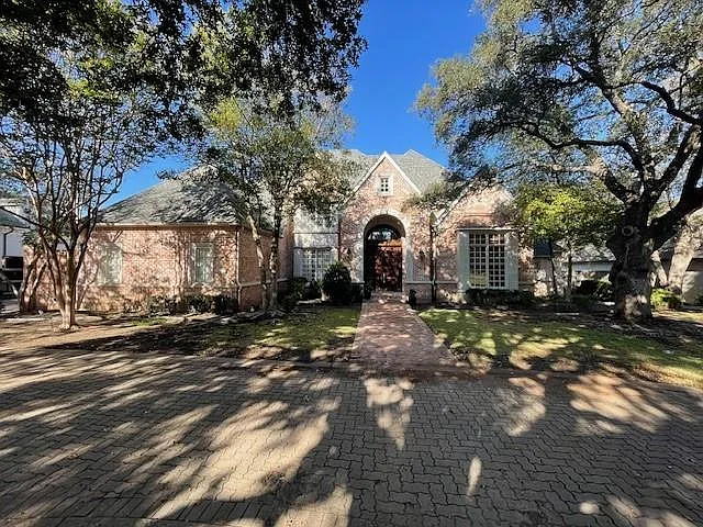 Tudor home with brick siding - 6341 Waggoner Dr