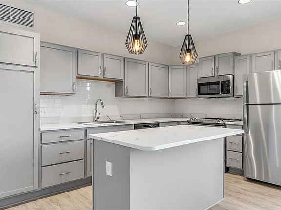 2nd image of 5712 Main St Unit 4