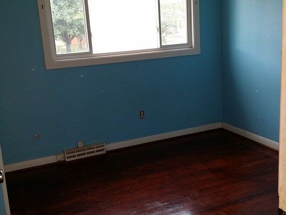 3rd bedroom : Wood floors refinished,WHOLE has hard wood floors and can look just like this.