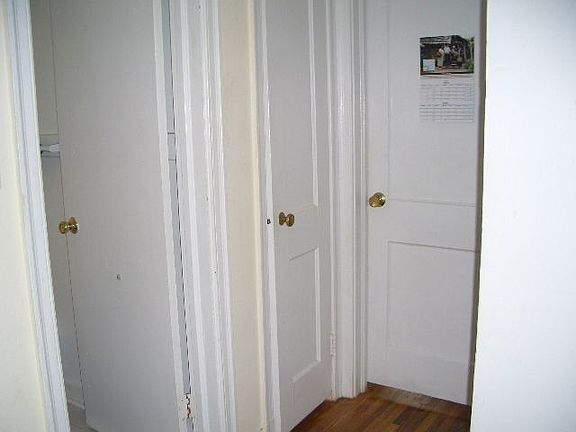 hallway - hardwood floors throughout