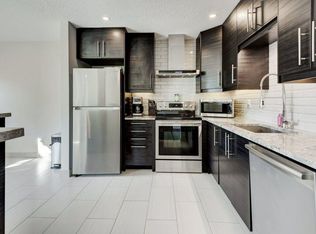 155 N Bracewood Way SW, Calgary, AB T2W 3C3
