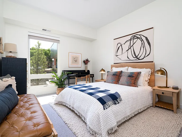 Spacious bedrooms provide a cozy retreat with plenty of natural light.