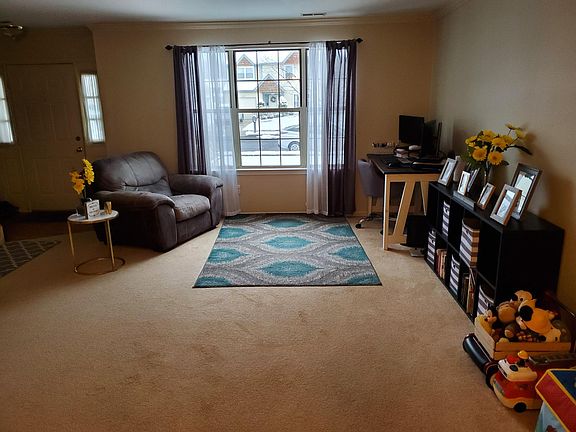 Large Living Room ( Viewed from Large Formal Dining Room ). VERY Open!!