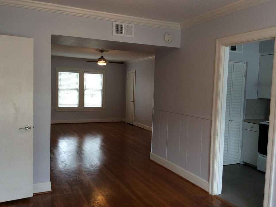 View from dining area into spacious living room.