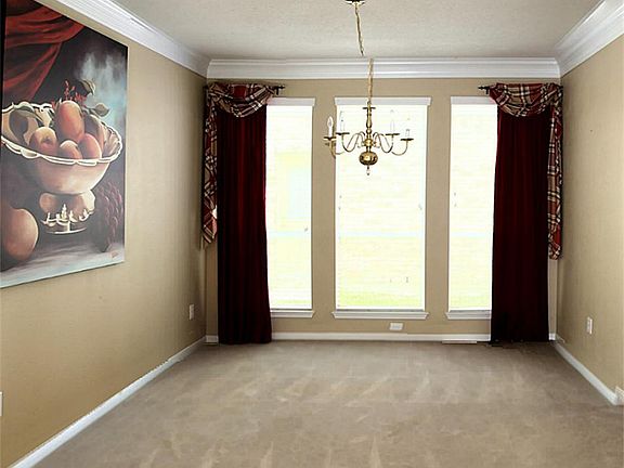 Formal dining room designed for lavish entertaining.