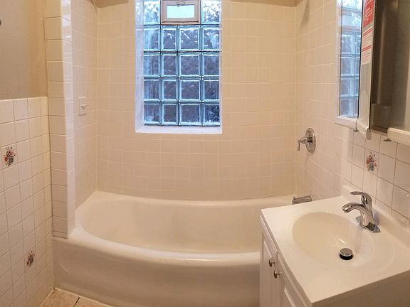 Full bath with new vanity, medicine cabinet and plumbing fixtures