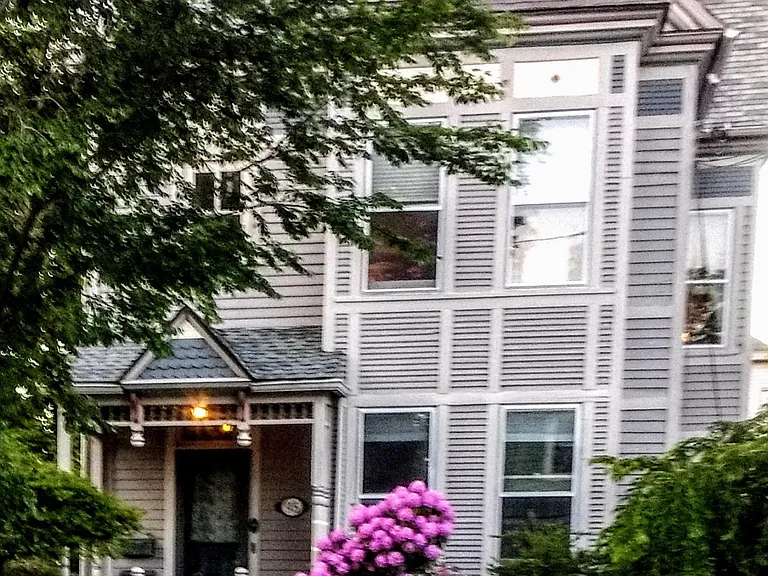 House is located on a tree-lined one-way street with adequate free street parking
