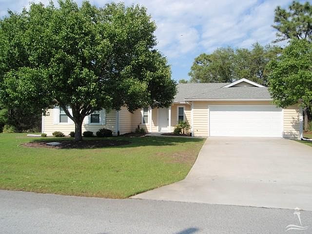 1st image of 18 SE Forest Oaks Drive