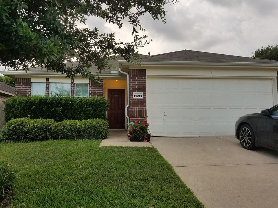 Beautiful home with easy to maintain yard and double car gar