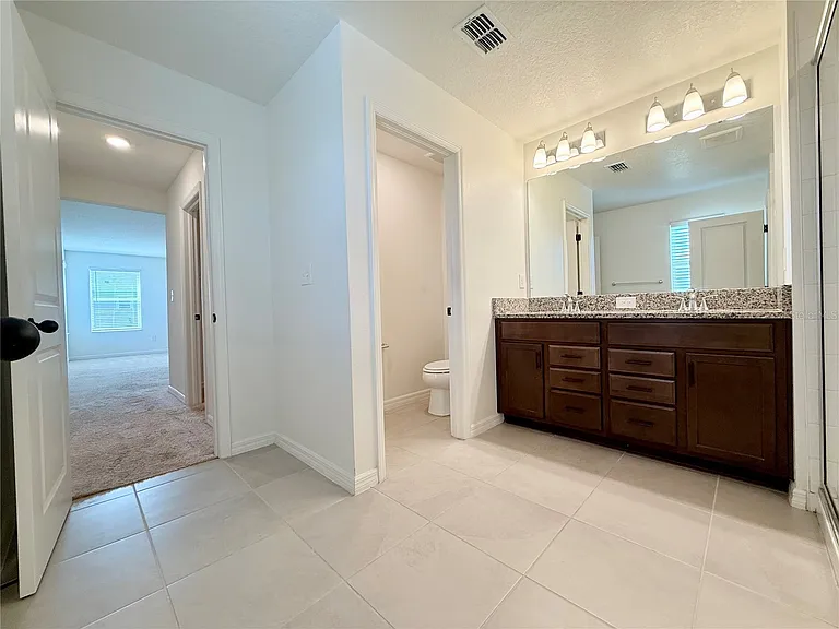 9544 Sandy Bluffs Cir — Photo 24