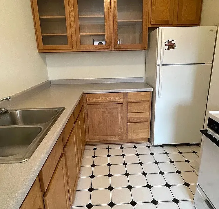 Embrace functionality in the well-designed kitchen of LS Capital Group. Features include ample cabinetry, modern appliances, and sleek countertops, perfect for culinary enthusiasts. Schedule a visit today to envision your new living space!