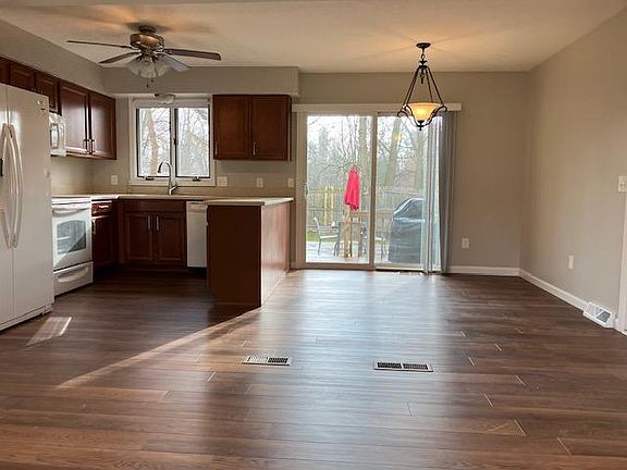 Open Kitchen, Dining and Living Room area with lots of natural light.