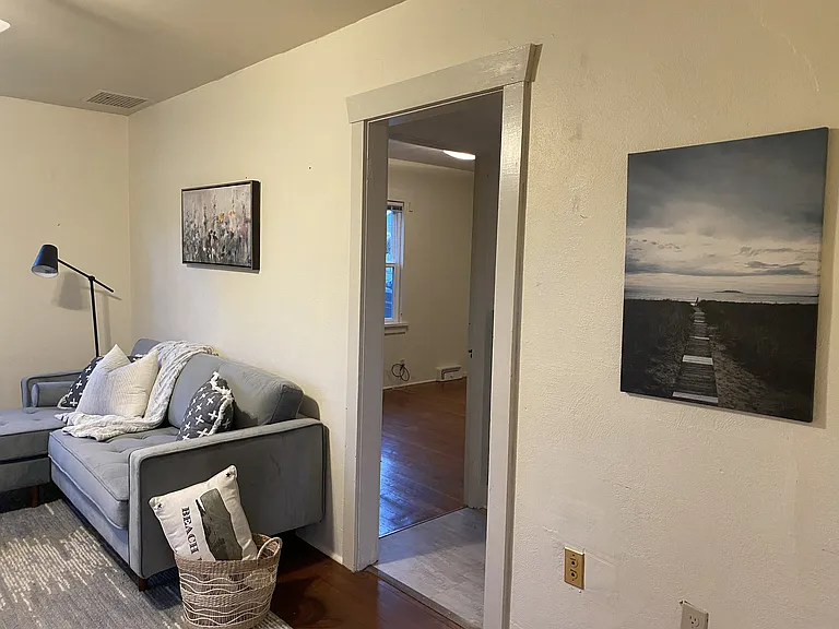 (home is not furnished) living room to hallway & primary bedroom