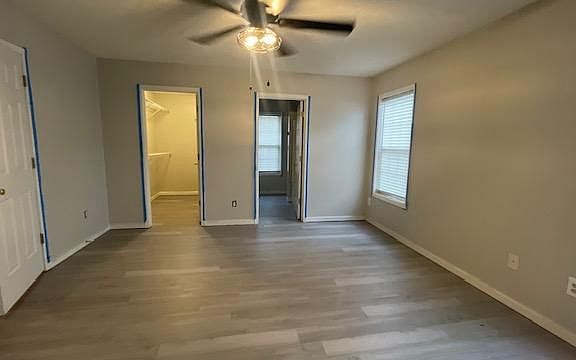 Master Bedroom overlooking Full Bath suite with linen closet and walk-in closet.