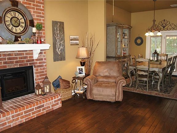 Wood floors in dining and living area, all overlooking your  beautiful covered deck