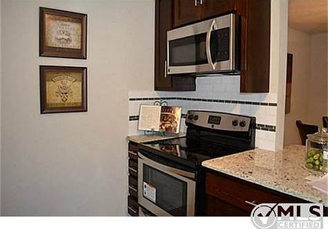 Remodeled kitchen with never before used stainless stove, ov