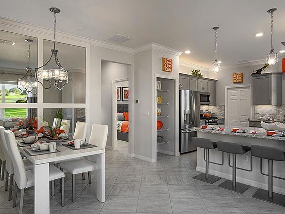 Oasis Model at On Top of the World Communities Dining Area