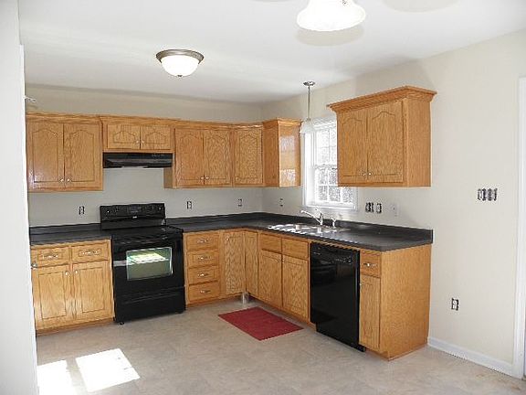 Huge open Kitchen with Oak cabinets
