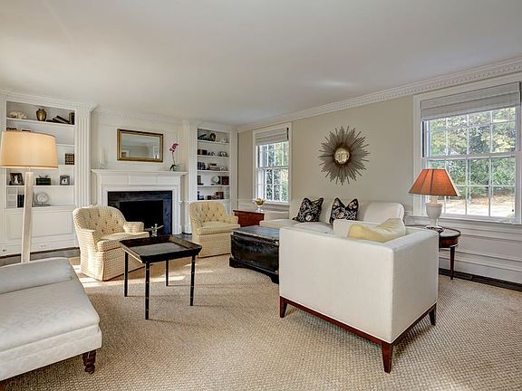 Living Room w/ Fireplace & Built-ins