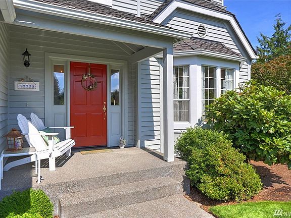 The covered front porch welcomes guests while also providing the ideal relaxing spot.