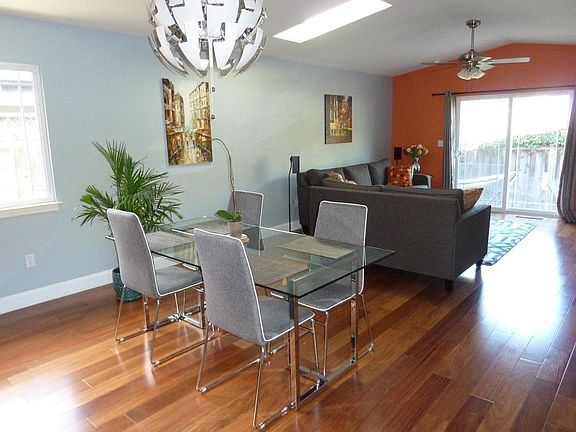 Family room & dining room (staged furniture)