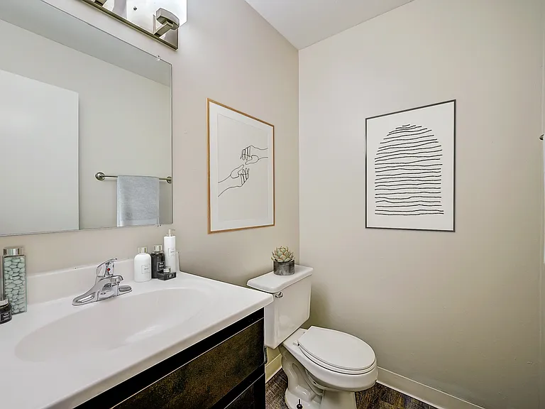 Recently Renovated Townhouse Style Apartments featuring New gray carpet, Neutral paint scheme, Premium hardwood-style flooring, Neutral paint scheme, Upgraded light fixtures, New cabinets, Matching stainless steel appliances, Washer/Dryer, Air conditionin