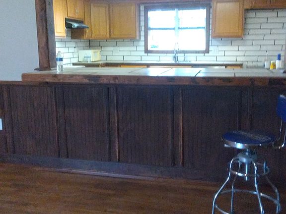 Bar over looking kitchen from livingroom
