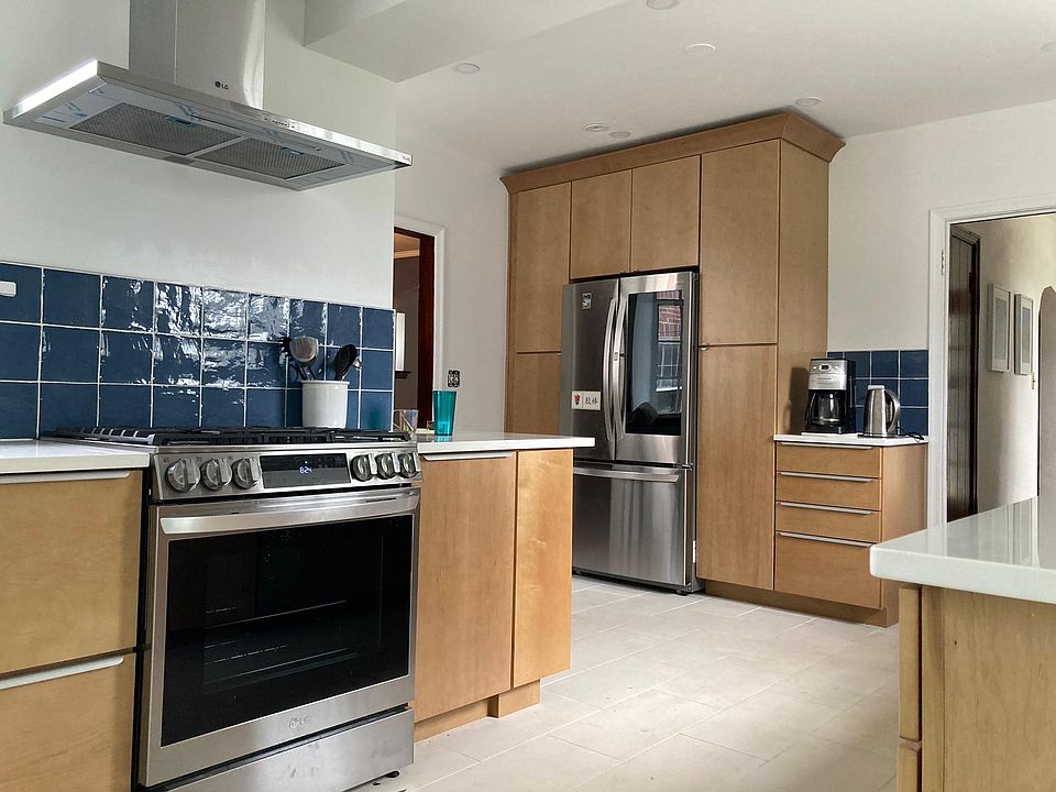 New kitchen with Calcutta Quartz countertops and high end appliances.