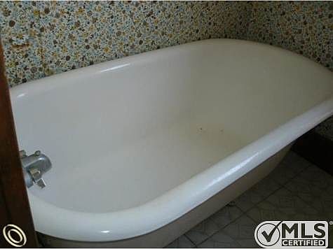footed tub w/ shower