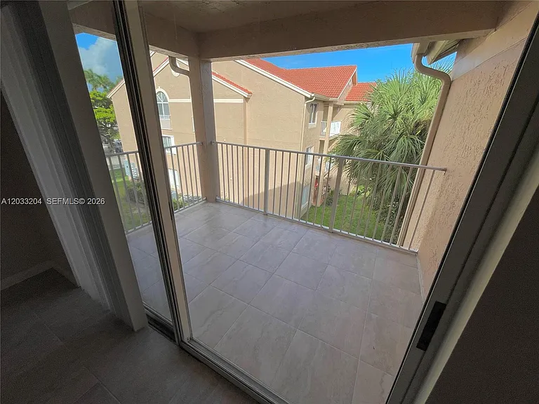 10521 SW 158th Ct #304 — Photo 25