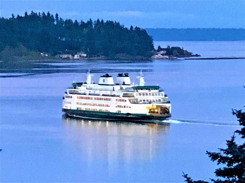 Indoor view: Large windows on both floors provide spectacular views of ferries, aircraft carriers, sailboats, and submarines navigating Rich Passage.