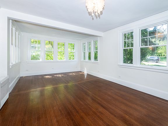 Living room is open to sun room
