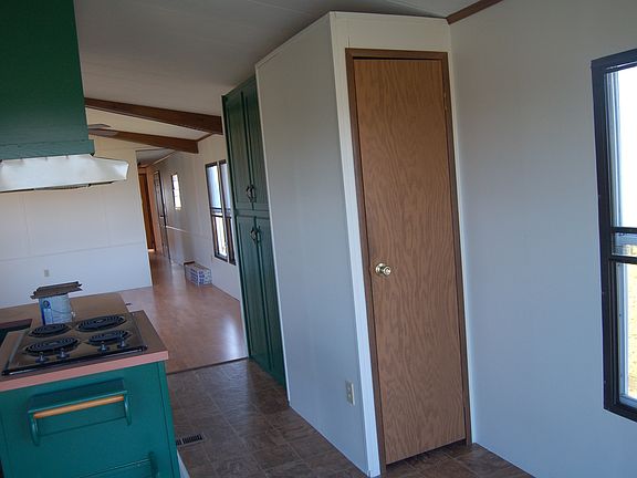 Kitchen looking into living room