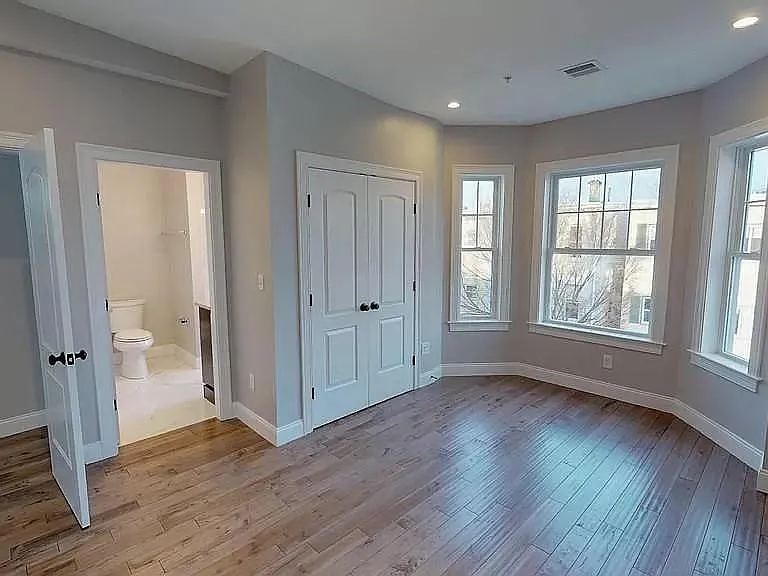 Primary bedroom + bathroom