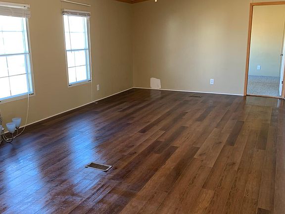 Living room with new LVP flooring.