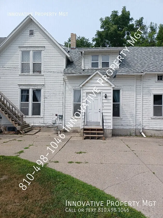 Large 3-bedroom multi-dwelling unit located in Clio! — Photo 1
