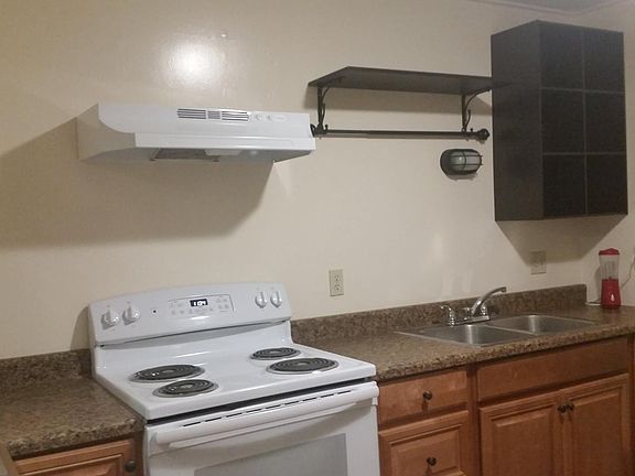 New kitchen! Towel racks can store pots and pans with hooks.