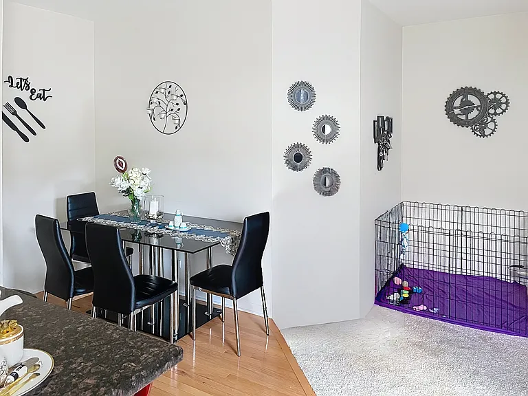 Breakfst area with partial view of the family room