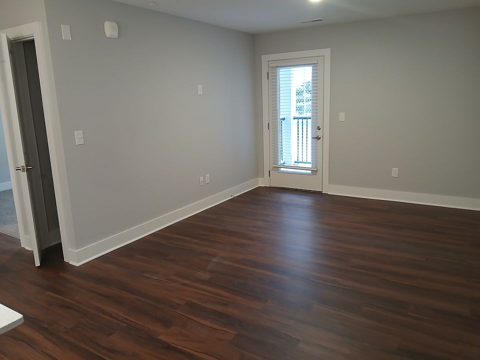 Living Area , Balaconies on the 2nd and 3rd Flors and walk out patios on the 1st floor units