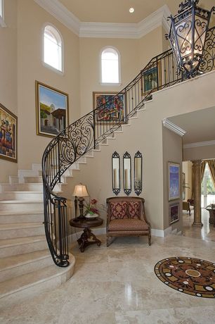 Mediterranean Staircase with Crown molding & limestone tile floors in ...