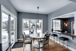 Transitional Dining Room with Carpet, Pendant Light, Hardwood floors, High ceiling