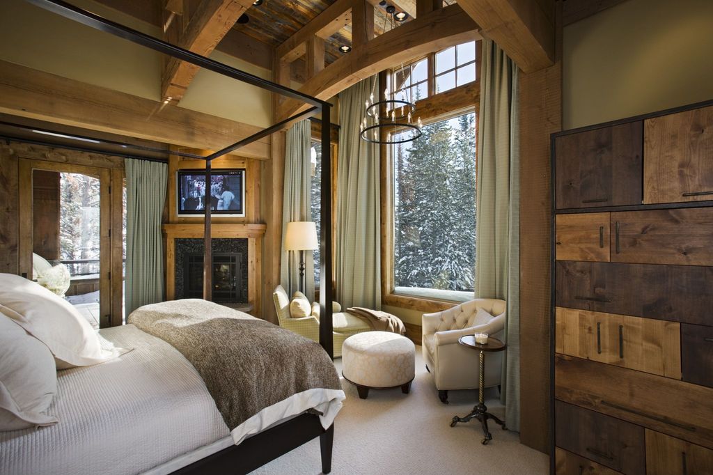 Rustic Master Bedroom With Chandelier By Locati Architects 