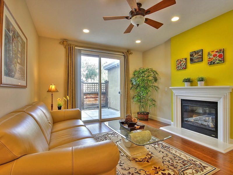 Eclectic Living Room With Hardwood Floors Ceiling Fan In San Eclectic Living Room With Hunter Waldon Onyx Bengal Bronze Downrod Or Flush Mount Ceiling Fan