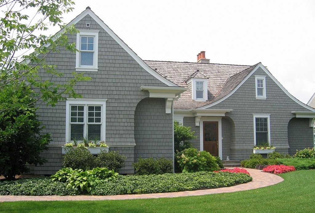 Traditional Exterior of Home with Brick pathway by KMM3231