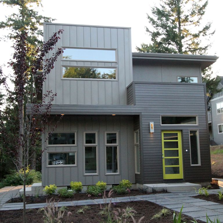  Modern  Exterior  of Home with French doors by Jordan 