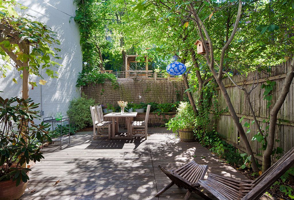 Eclectic Deck with Fence by The Corcoran Group | Zillow Digs | Zillow